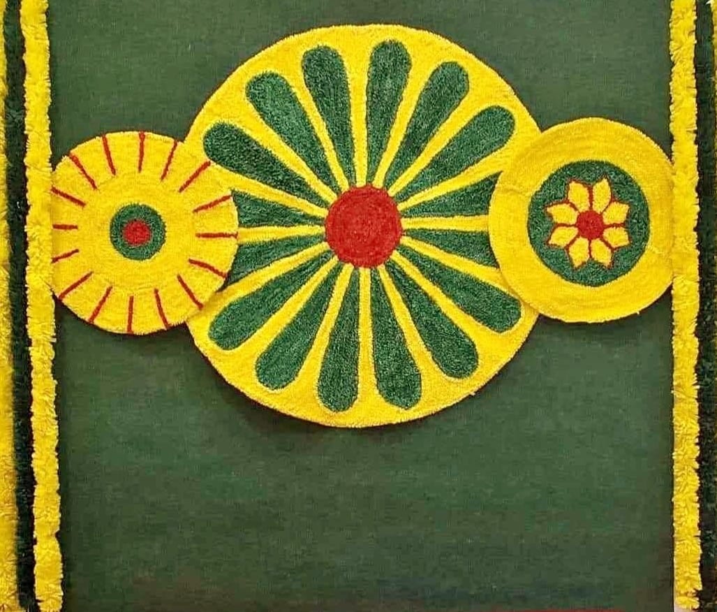 Green Backdrop with Rangoli Mat