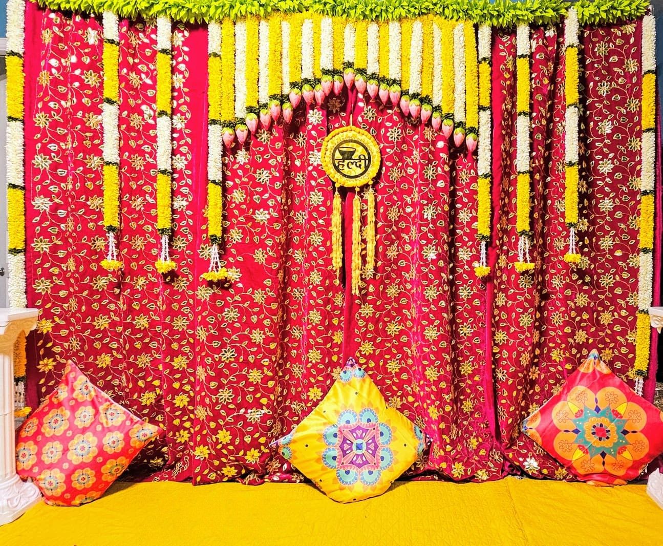 Red Backdrop and Pillow Arrangement